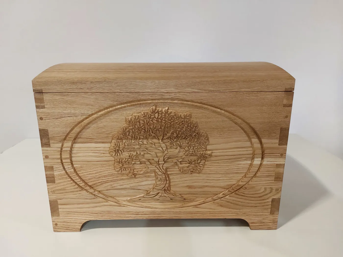 Oak chest with a carved tree of life, front