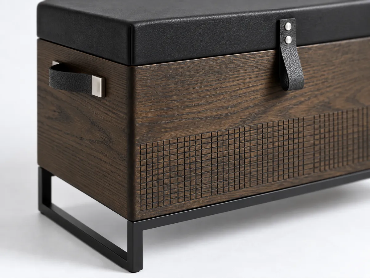 Close-up of a dark oak chest corner with a grid-textured band, resting on a black steel sled frame — AI concept