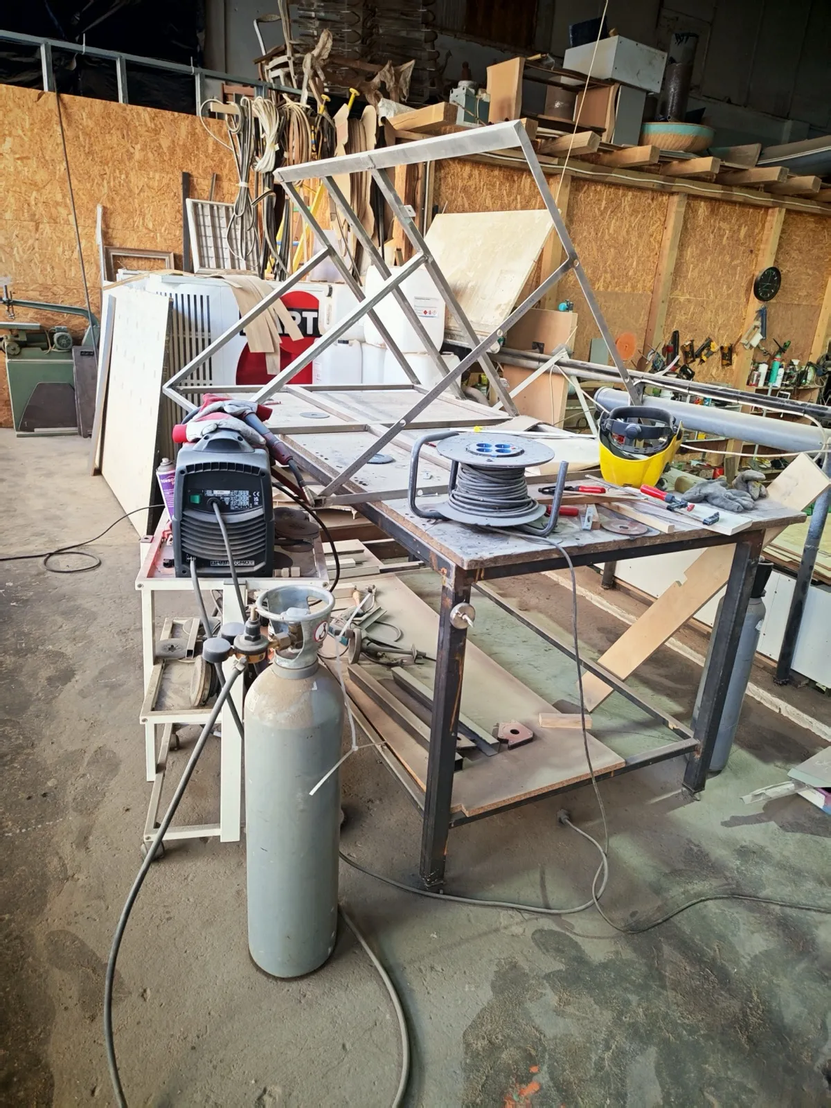 Racks of cut panels staged for the next stage of production