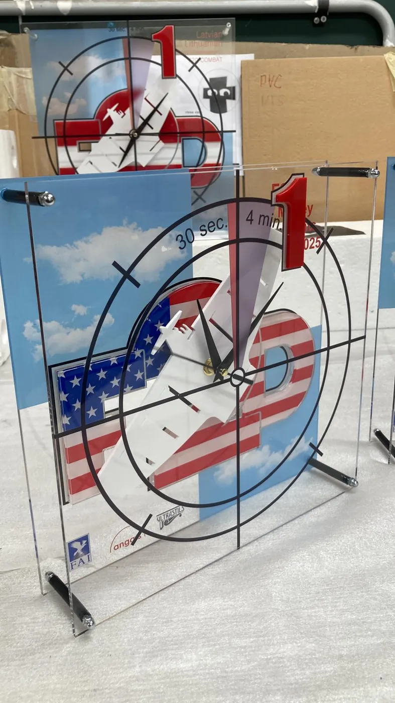 Clear acrylic trophy with a printed target design, a raised number one and clock hands